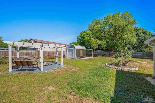 view of yard with a fenced backyard, a pergola, a patio area, and an outbuilding
