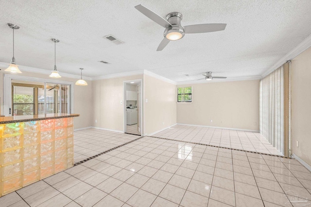 unfurnished living room with ceiling fan, ornamental molding, light tile patterned floors, and visible vents