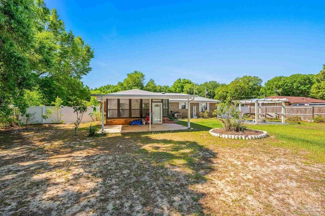 view of yard featuring a patio area and a fenced backyard