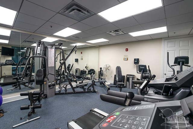 gym featuring a drop ceiling and visible vents