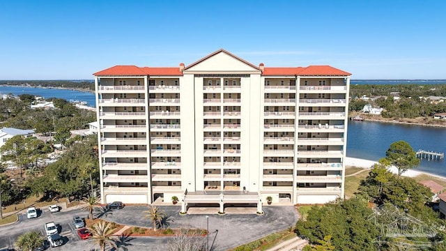 view of building exterior with a water view