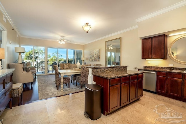 kitchen featuring ceiling fan, a sink, open floor plan, reddish brown cabinets, and dishwasher