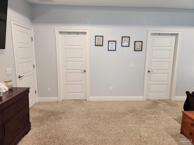 interior space with light colored carpet