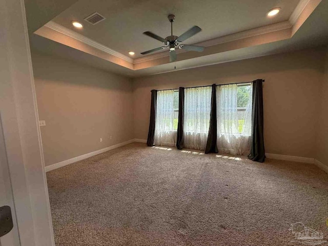 7912 Stream Ridge Rd, Pensacola, FL 32526 - carpeted empty room featuring a tray ceiling, ornamental molding, ceiling fan, baseboards, and recessed lighting