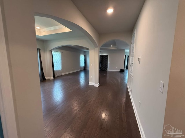 7912 Stream Ridge Rd, Pensacola, FL 32526 - corridor featuring arched walkways, dark wood-type flooring, baseboards, crown molding, and recessed lighting