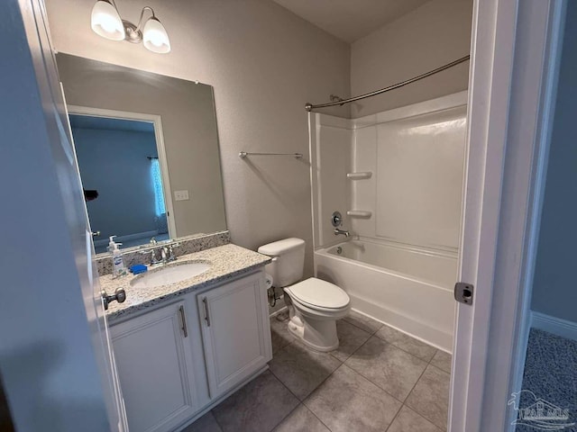 7912 Stream Ridge Rd, Pensacola, FL 32526 - full bathroom with vanity, toilet, washtub / shower combination, and tile patterned flooring