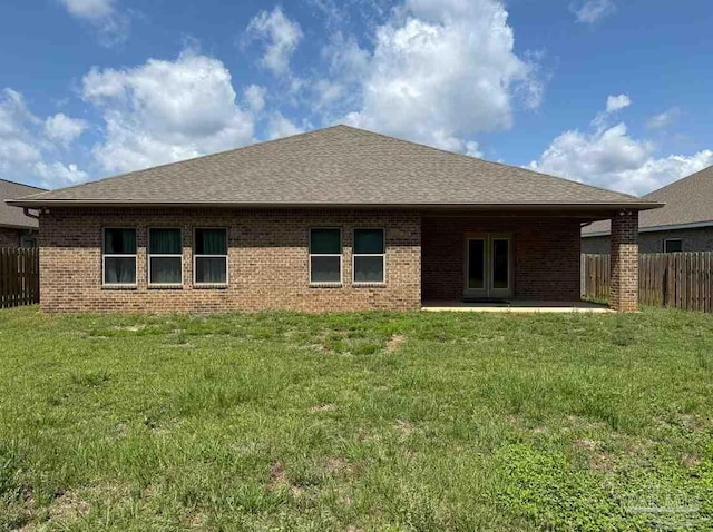 7912 Stream Ridge Rd, Pensacola, FL 32526 - rear view of property featuring brick siding, a shingled roof, and a patio