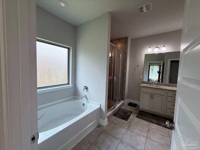 7912 Stream Ridge Rd, Pensacola, FL 32526 - full bathroom with vanity, a bath, a shower stall, and tile patterned flooring