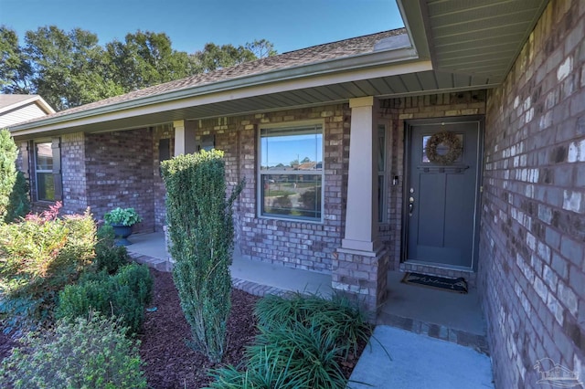 doorway to property with covered porch