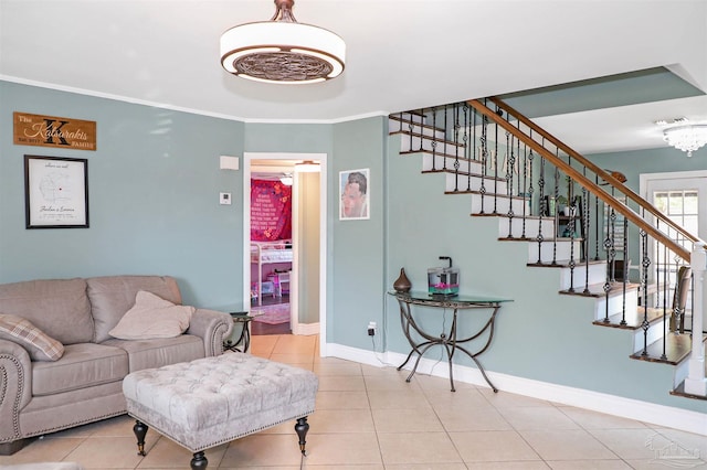 living room with crown molding and light tile patterned floors