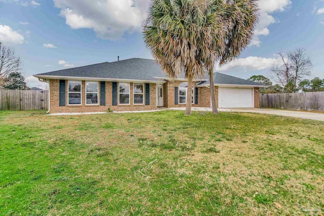 single story home with a garage and a front yard