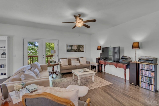 living room featuring french doors, a ceiling fan, and wood finished floors