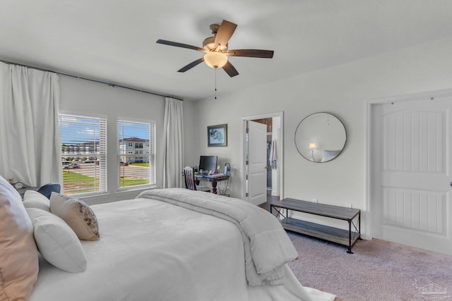 carpeted bedroom featuring a ceiling fan