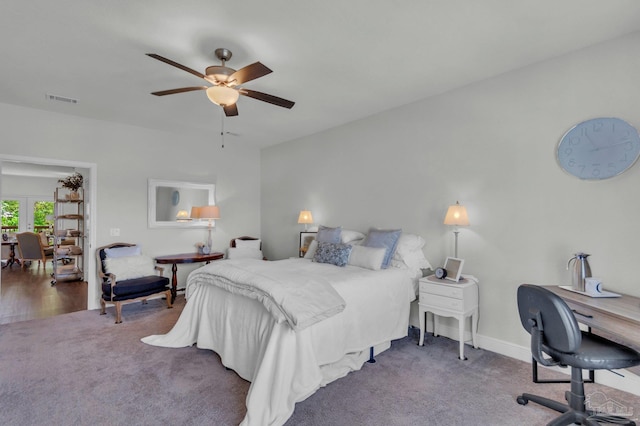 bedroom featuring baseboards, carpet flooring, french doors, visible vents, and ceiling fan