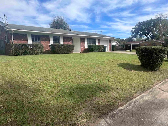 ranch-style house featuring a front lawn