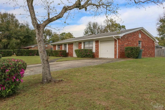 single story home featuring a garage and a front yard