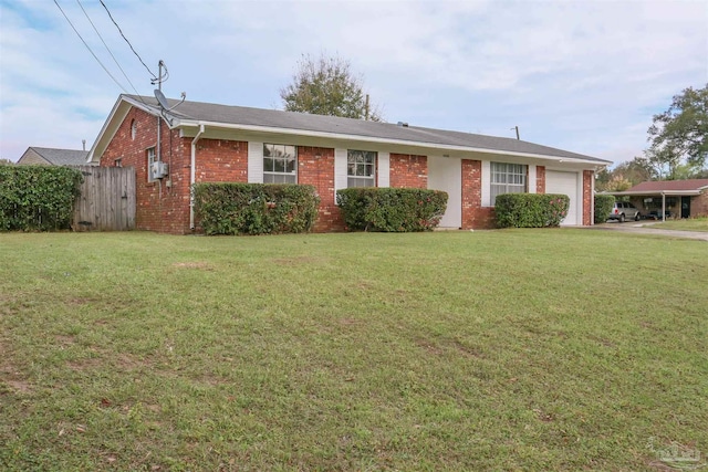 single story home featuring a garage and a front lawn