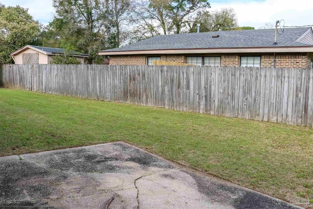 view of yard with a patio area