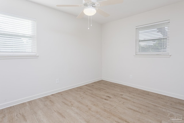 unfurnished room with light hardwood / wood-style floors and ceiling fan