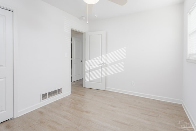 unfurnished room featuring ceiling fan and light hardwood / wood-style floors