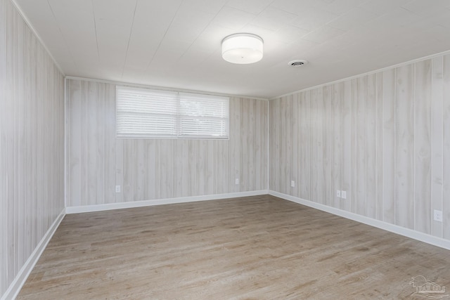 empty room with light wood-type flooring