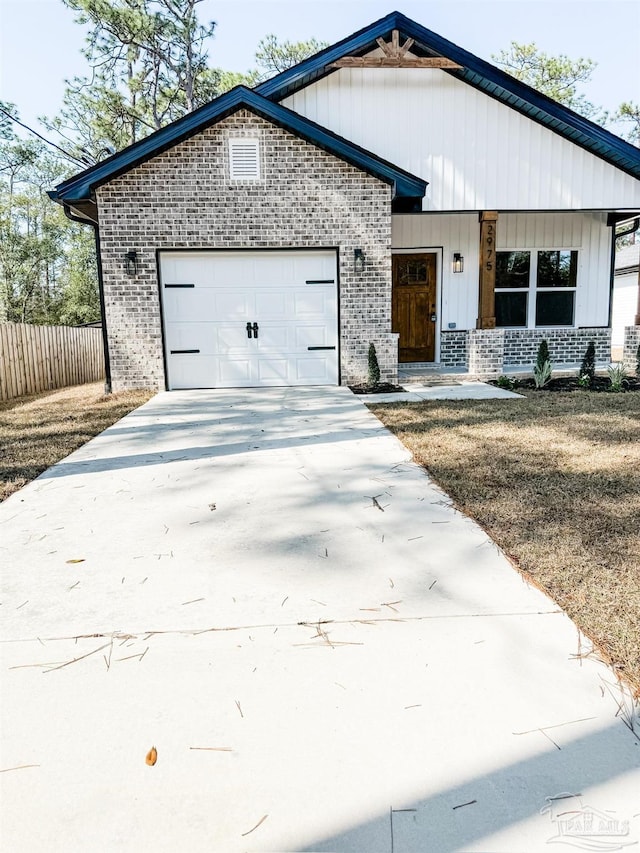 view of front of property featuring a garage