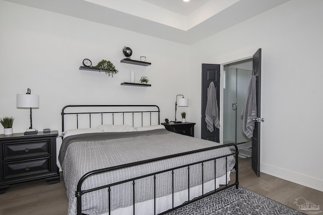 bedroom featuring dark hardwood / wood-style floors