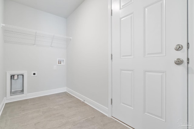 washroom with light tile patterned flooring, hookup for a washing machine, and electric dryer hookup