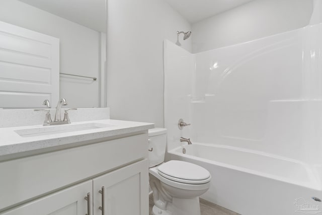 full bathroom featuring vanity, toilet, and shower / washtub combination