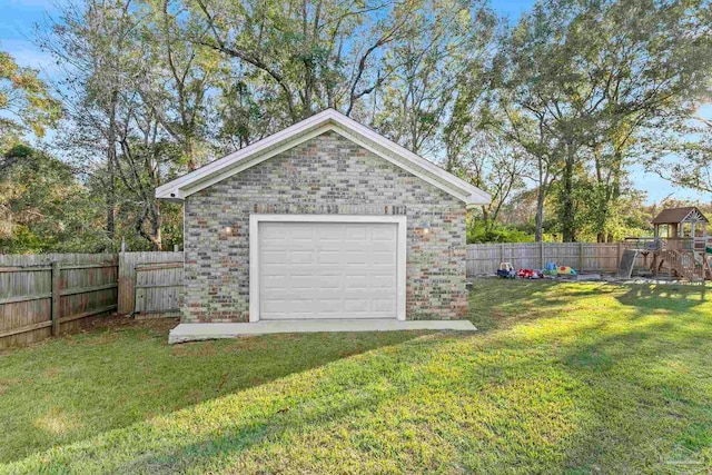 garage with a lawn