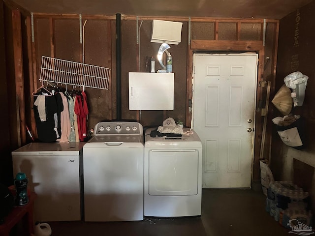 laundry area with independent washer and dryer