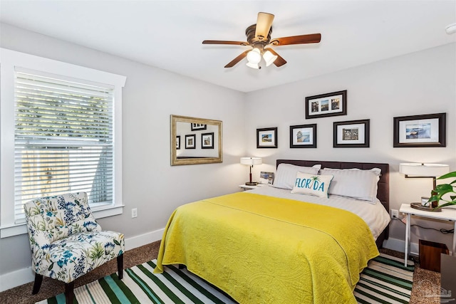 bedroom featuring ceiling fan and carpet flooring