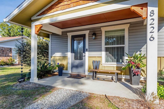 property entrance with a porch