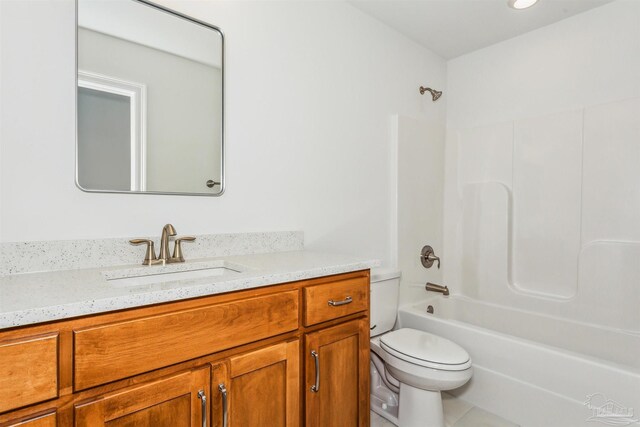 bathroom with tile patterned flooring, shower / bathtub combination, toilet, and vanity