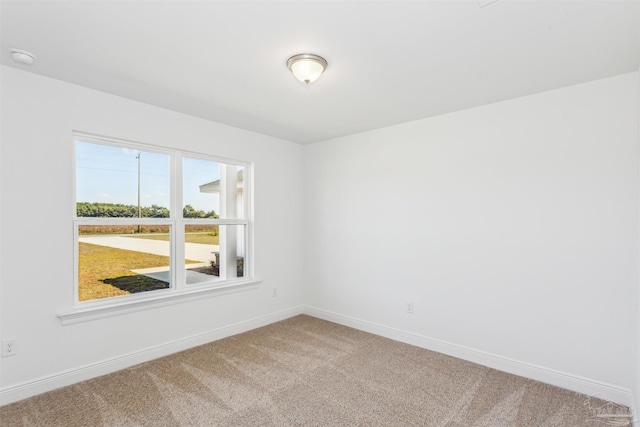 9319 Salter Rd, Pace, FL 32571 - unfurnished room with baseboards and carpet