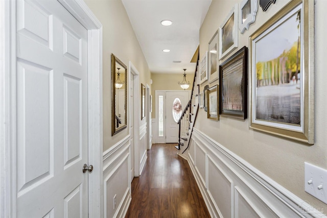 hall with dark wood-type flooring