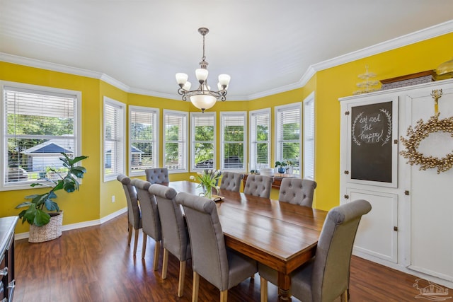 dining room with ornamental molding, dark wood-type flooring, and an inviting chandelier