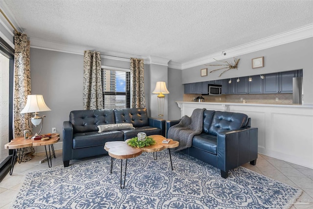 tiled living room featuring ornamental molding and a textured ceiling