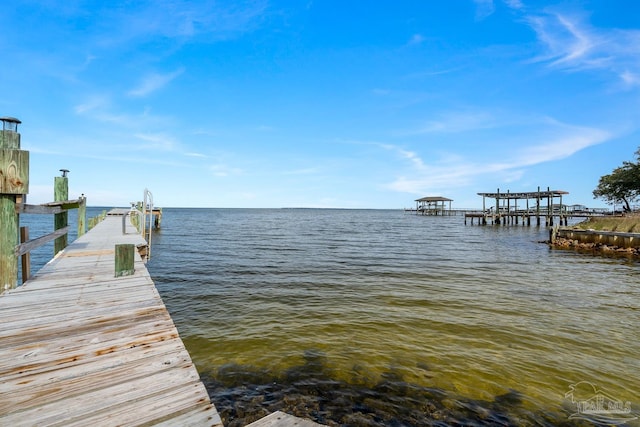 dock area featuring a water view