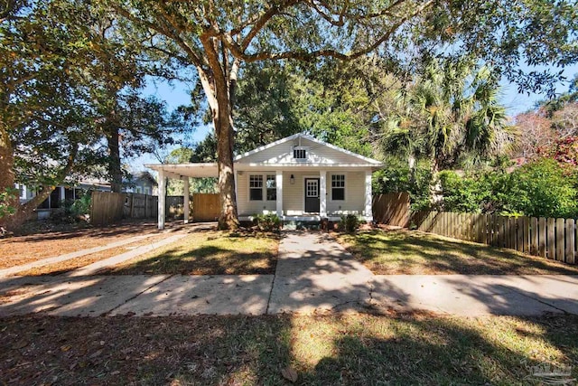 view of front facade featuring a carport and a porch