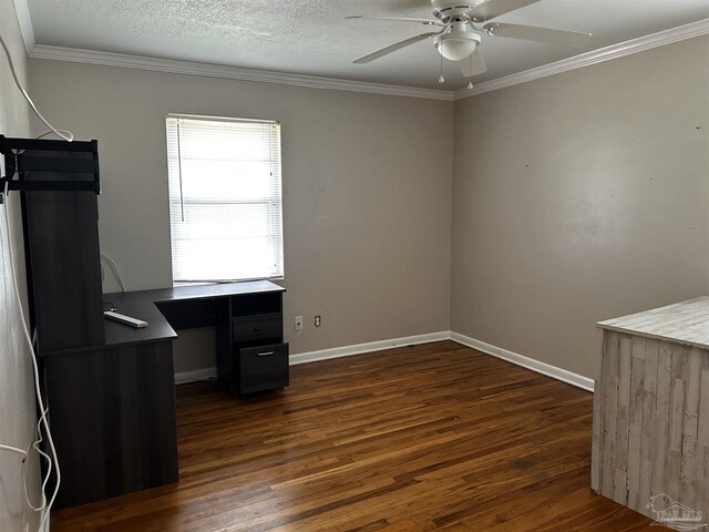 unfurnished office featuring ornamental molding, a textured ceiling, ceiling fan, and dark hardwood / wood-style floors