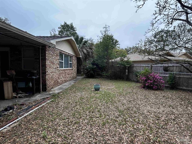 view of yard with fence