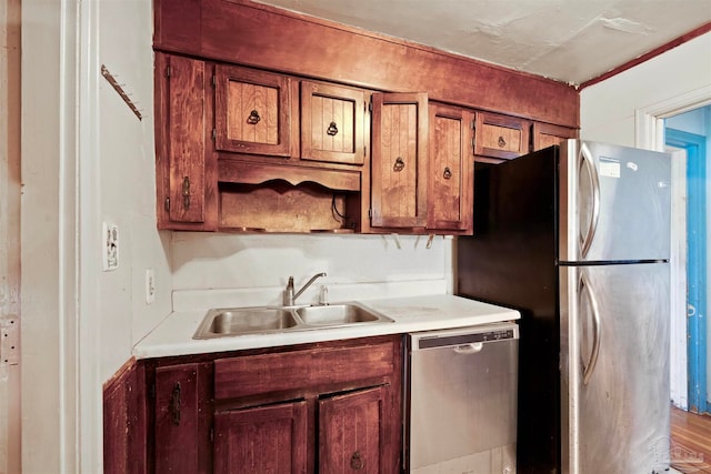 kitchen with sink and stainless steel appliances