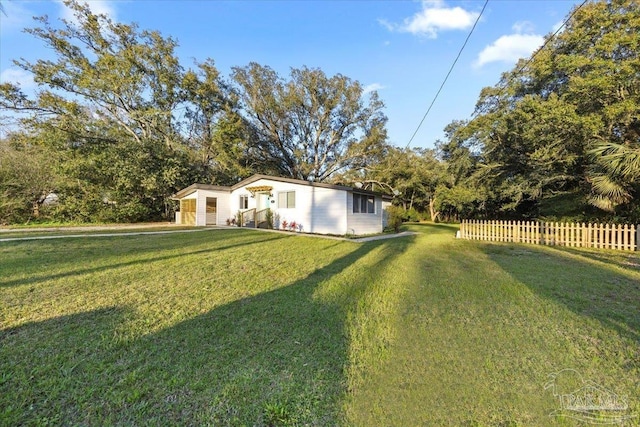 view of yard with fence