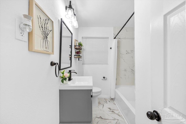 bathroom with shower / bath combo with shower curtain, marble finish floor, toilet, and vanity