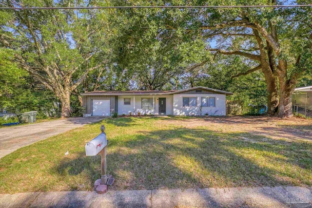 ranch-style house with a front lawn and a garage