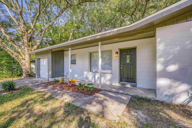 entrance to property with covered porch