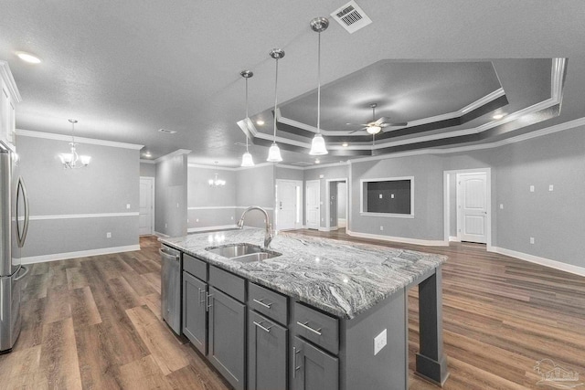 591 Nowak Rd, Cantonment, FL 32533 - kitchen featuring a sink, open floor plan, a chandelier, crown molding, and gray cabinetry