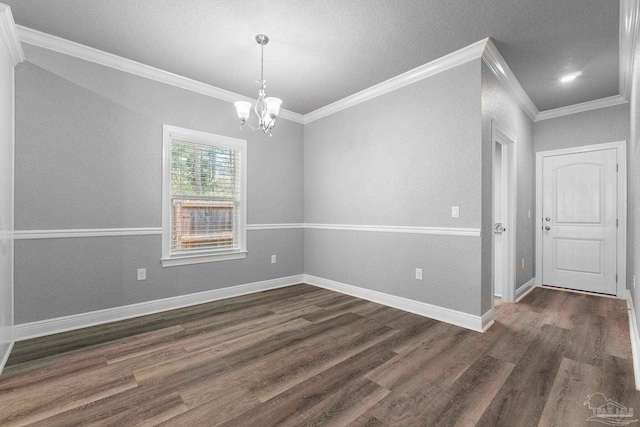 591 Nowak Rd, Cantonment, FL 32533 - empty room with crown molding, dark wood-style floors, a chandelier, and baseboards
