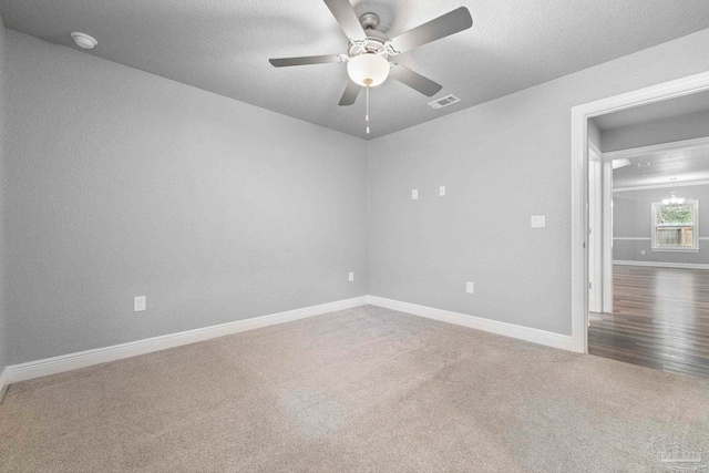 591 Nowak Rd, Cantonment, FL 32533 - spare room featuring ceiling fan, carpet floors, baseboards, a textured ceiling, and a smoke detector